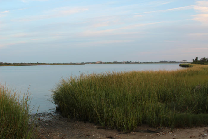 The view from the Shinnecock Indian Nation Territory across Shinnecock Bay to the mansions that dot the other side. (Photo by Alexandra Talty)