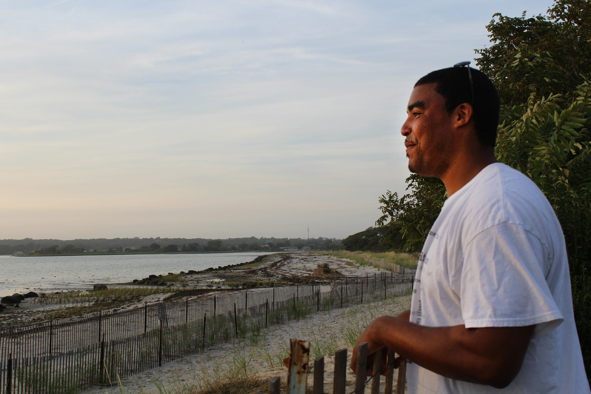 Shinnecock tribe member Shane Weeks looks out over the tribe's territorial waters. (Photo by Alexandra Talty)