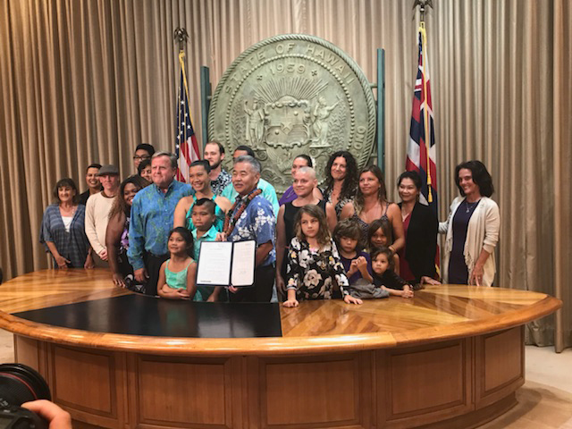 David Ige after signing the chlorpyrifos ban into law.