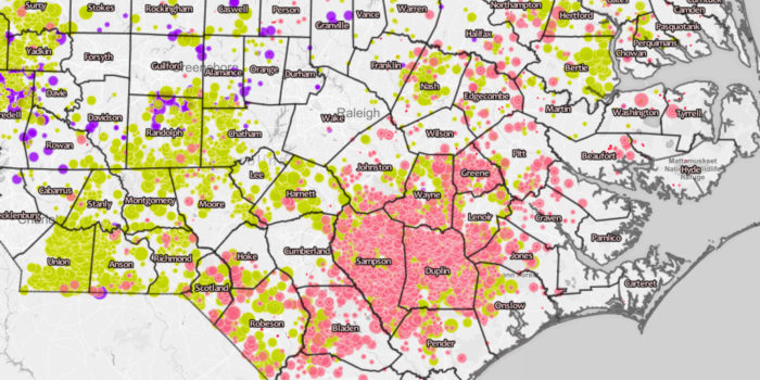 A map of hog and poultry CAFOs in North Carolina; the red dots represent hogs, and Samson and Duplin counties are in the bottom-middle of the map. (Map courtesy of EWG and Waterkeeper Alliance)