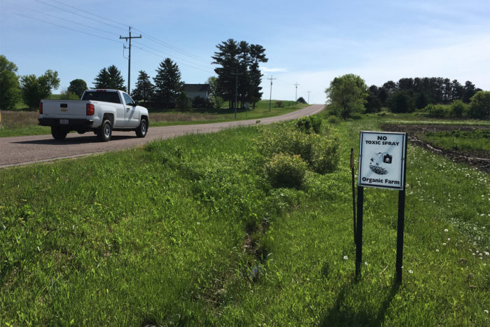 The "organic farm" sign outside of Thao's Garden.