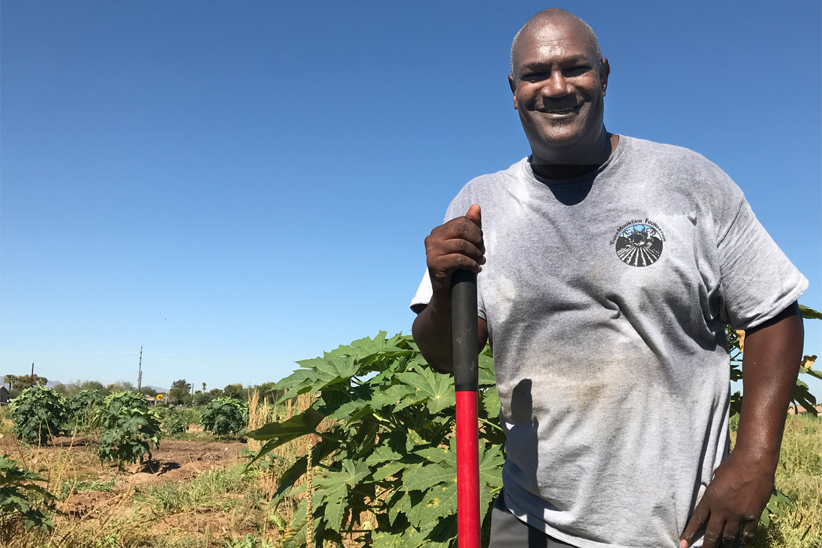 Darren Chapman in the field at TigerMountain urban farm.