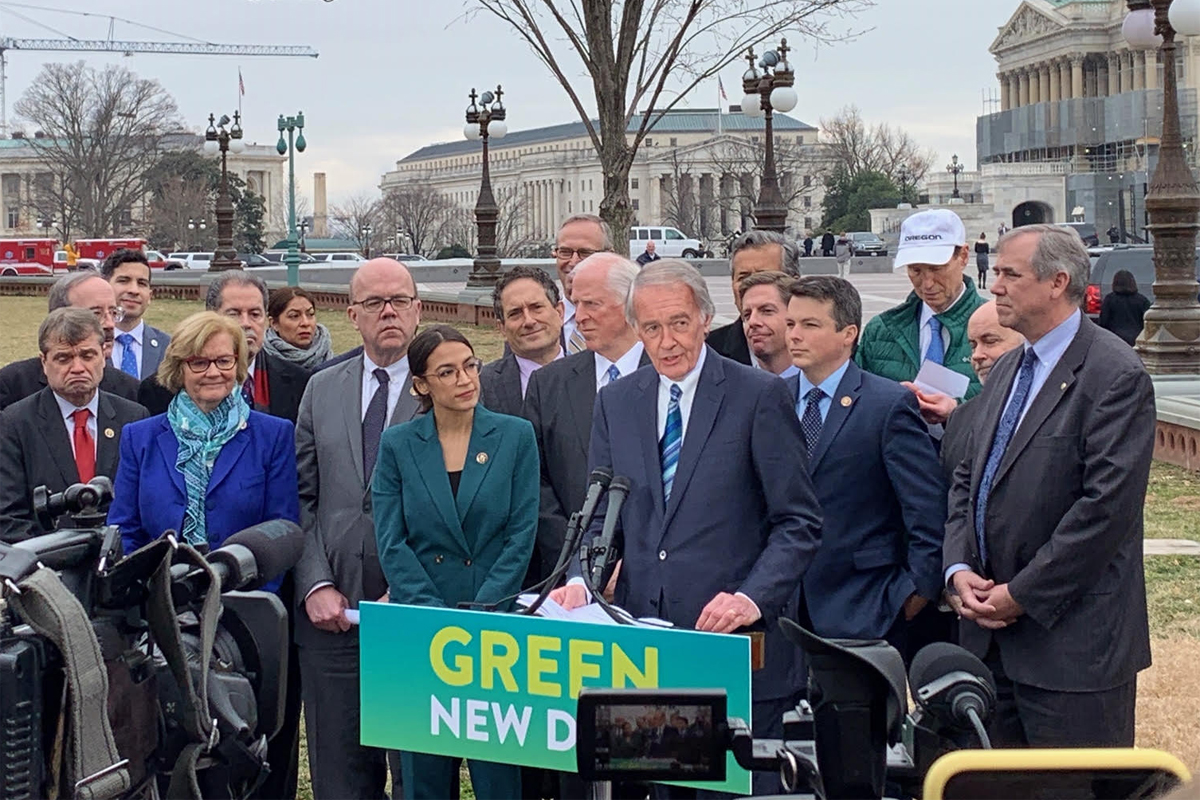 Rep. Alexandra Ocasio-Cortez and Sen. Ed Markey during the introduction of the Green New Deal resolutions.