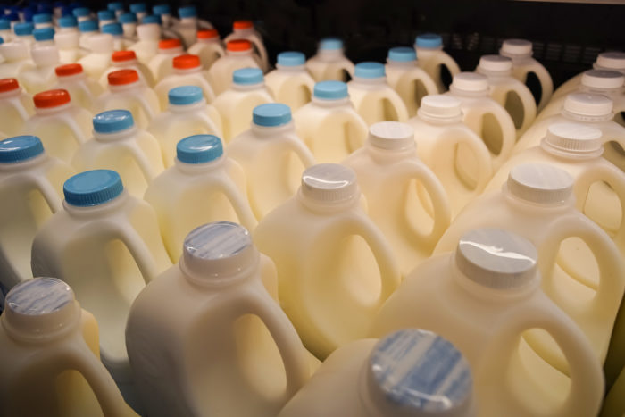 rows of bottles of raw milk