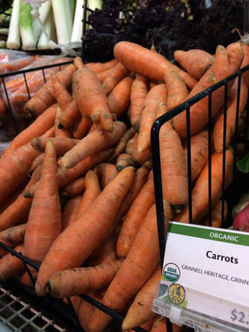 Grinnell Heritage Farm carrots for sale at New Pioneer Coop, Iowa City. (Photo courtesy of Grinnell Heritage Farm)