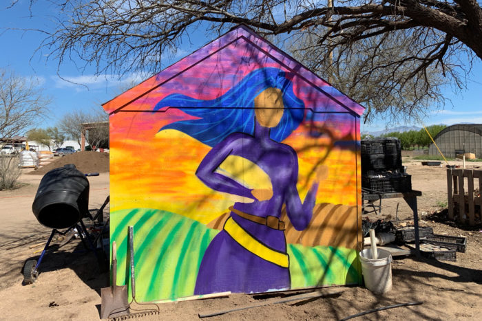 A colorful mural serves as a reminder of San Xavier's ancestral roots. (Photo by Rudri Patel)