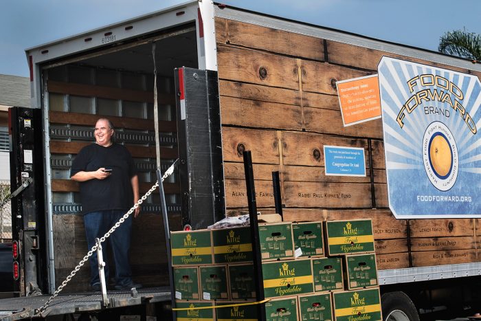 Luis Yepez inside a Food Forward produce rescue truck. (Photo © Jen Serena)