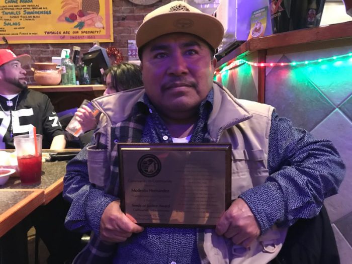 Modesto Hernandez, receiving a 2018 Seeds of Justice Award from from C2C. (Photo courtesy of C2C)