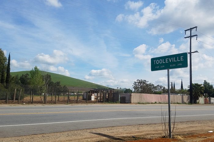 the sign for tooleville in the central valley of california