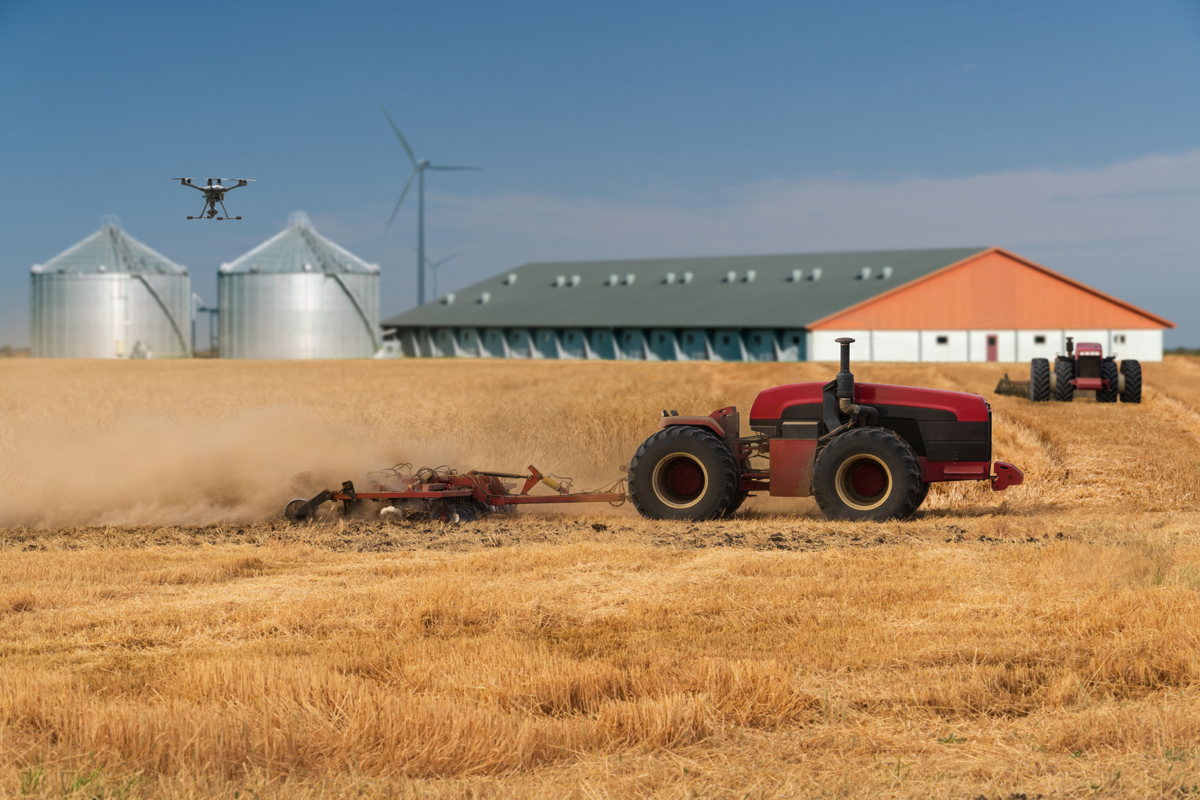 autonomous tractors and drones on a farm