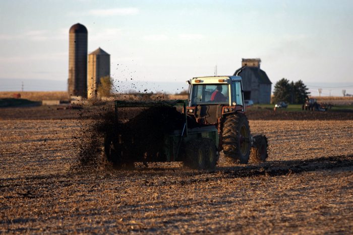 Tractor spreading biosolids. Photo CC-licensed by the City of Geneva, Illinois.