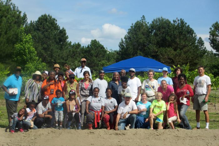 A farm tour group at Lola's Organic Farm.(Photo credit: Candace Pollock Moore / SSARE)