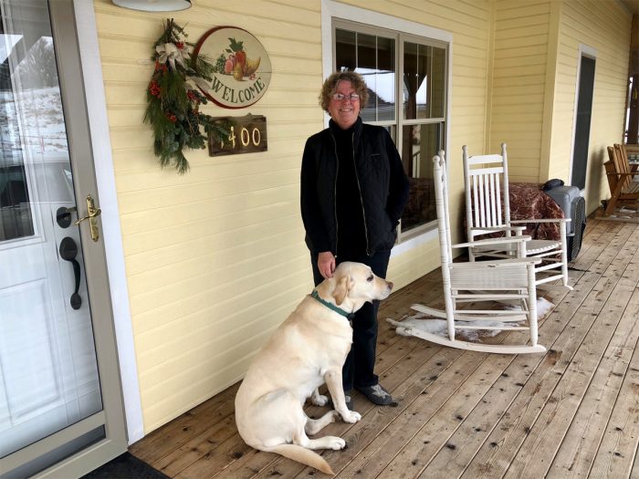 Linda Luhring outside her home in Iowa