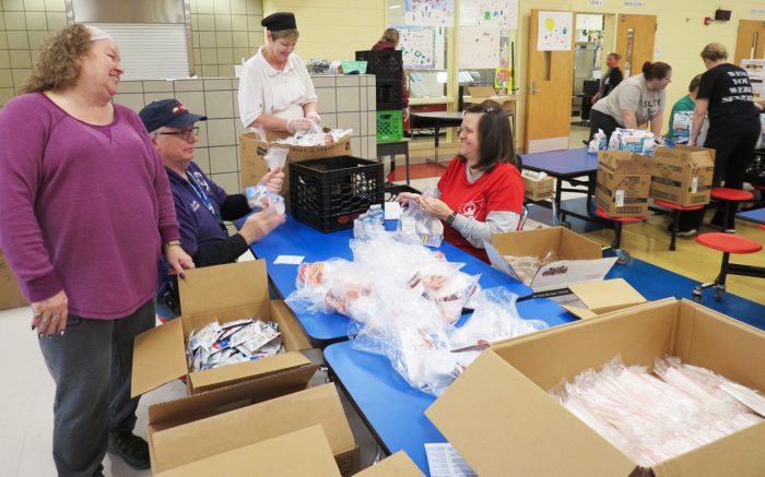 Volunteers filling food delivery boxes. Photo courtesy of Bullitt County Public Schools.