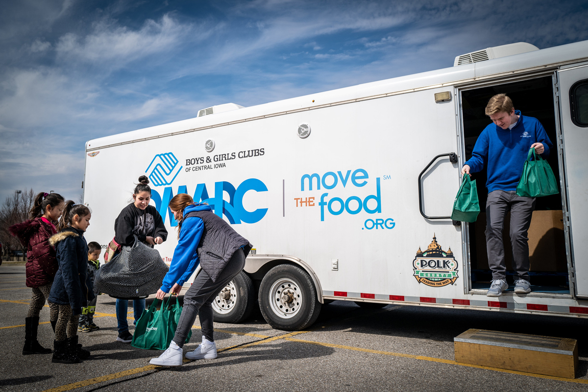 food assistance from a mobile food pantry. (Photo CC-licensed by Phil Roeder)