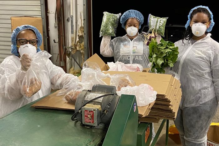 Packing greens for local markets at Indian Springs Farmers Co-op in Mississippi. (Photo courtesy of the Federation of Southern Cooperatives.)