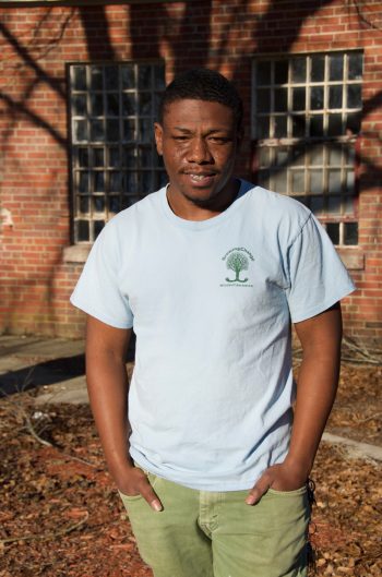 Terrence Smith was an original member of Growing Change, becoming involved in 2011 at the age of 14. He now serves as the organization's farm manager.