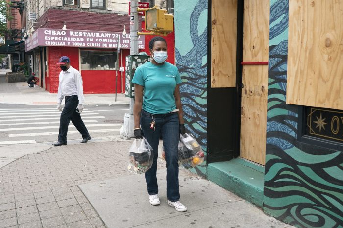 Linda White delivers food on Manhattan’s Lower East Side. During the protests, businesses were boarded up after nearby establishments were looted. Some of the streets were closed. “Regardless of what’s happening,” she said, “we're gonna make it work, even if we have to park three blocks down and have to walk. You gotta take the good and the bad. Not every day is gonna be smooth sailing.”