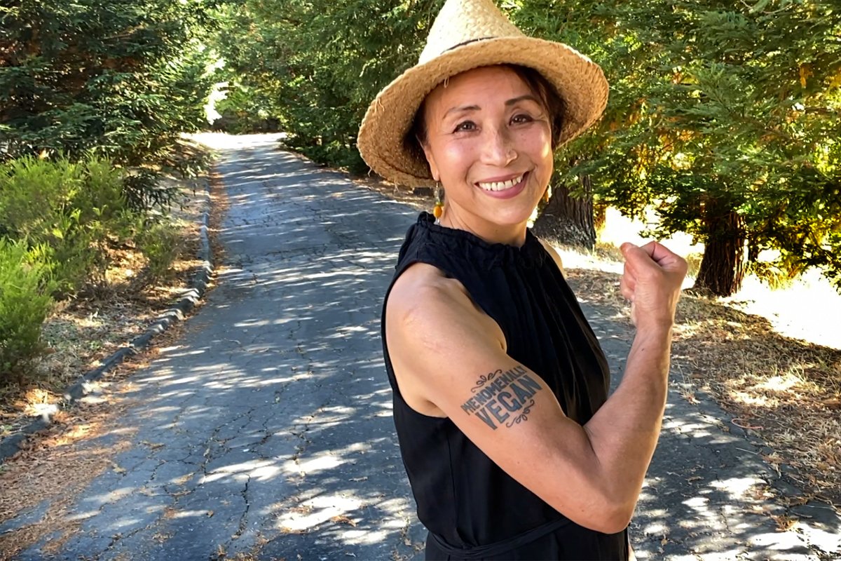 Miyoko Schinner of Miyoko's Creamery poses with her "powerfully vegan" tattoo on her farm where she works to end animal cruelty