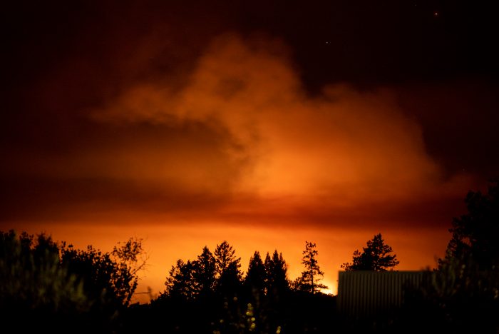 The Walbridge Fire burned one mile away from farmworkers as they picked in the vineyard. The Walbridge Fire, which was started by a rare summer lightning storm, has burned 54,940 acres and destroyed 126 homes.