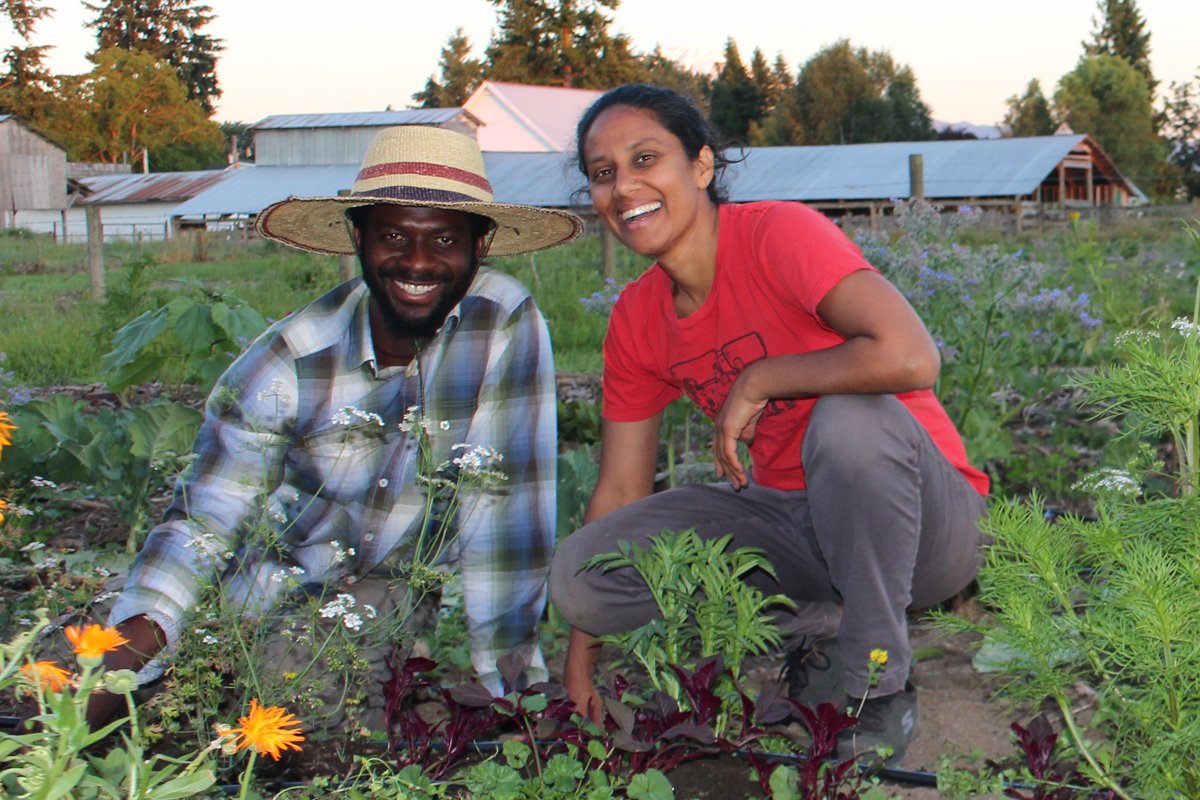 Victor Anagli and Deepa Iyer at Ayeko Farm. (Photo courtesy of Deepa Iyer)