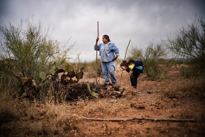 Twila Cassadora and her niece hunt rats in the Arizona desert. (Photo credit: Renan Ozturk)