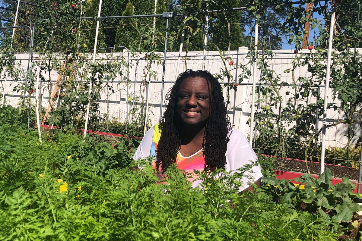 Nicole Virgil in her backyard garden.