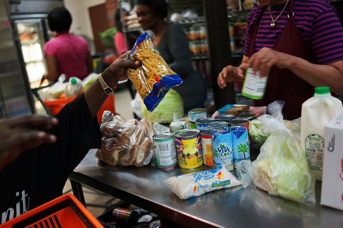 stocking bags from a food pantry.