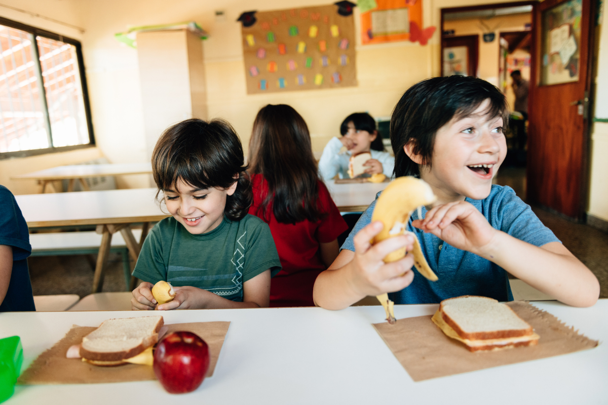 Elementary Students at Lunch break in School Cafeteria