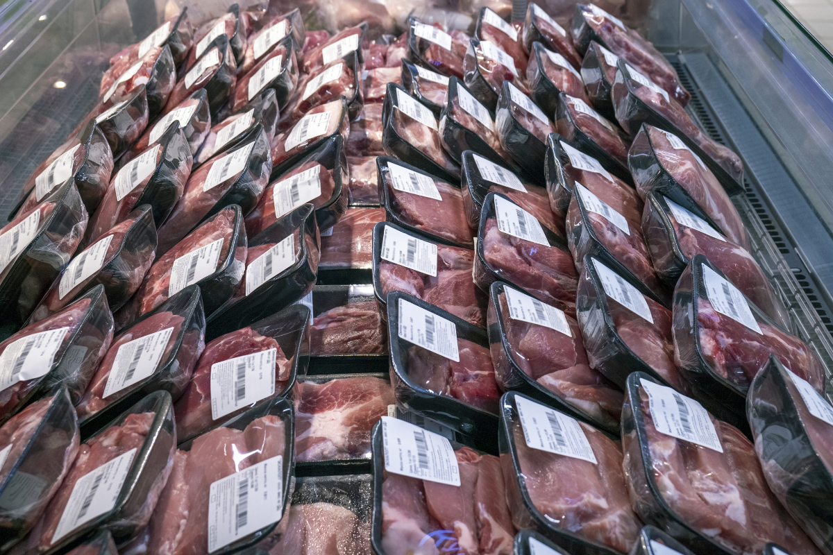 Packaged pieces of meat on a supermarket showcase