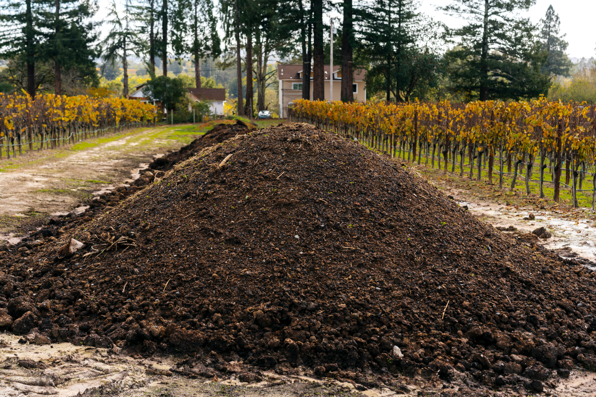 A pile of compost in the farm field at Shone Farm, a teaching farm at Sonoma State University in California. (Photo by Emma K. Morris)