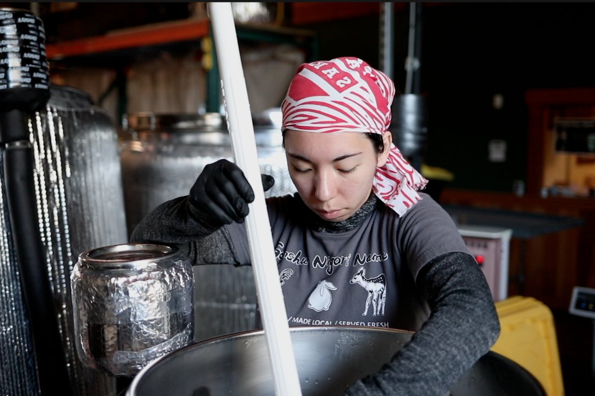 Olivia Kamei Myrick crafting sake at Sequoia Sake in San Francisco.