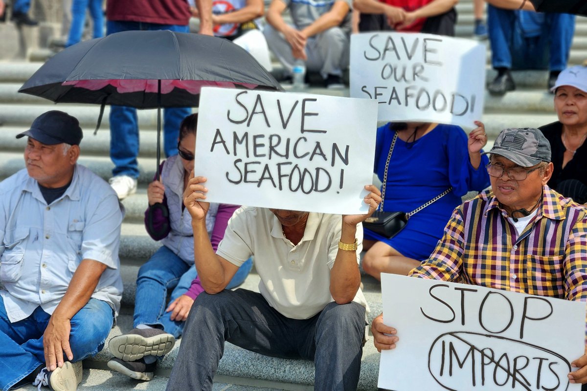 Louisiana shrimp harvesters at a rally for higher pay per catch. (Photo credit: Grey Moran)