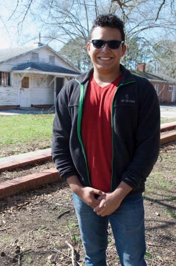 Norman Garcia-Lopez started working with Growing Change a year ago and now helps oversee the beekeeping operation.