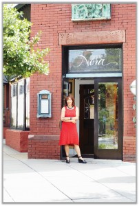 Nora Pouillon in front of Restaurant