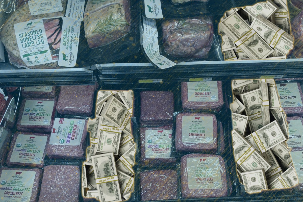 a case of meat at a walmart store with some products replaced with dollar bills